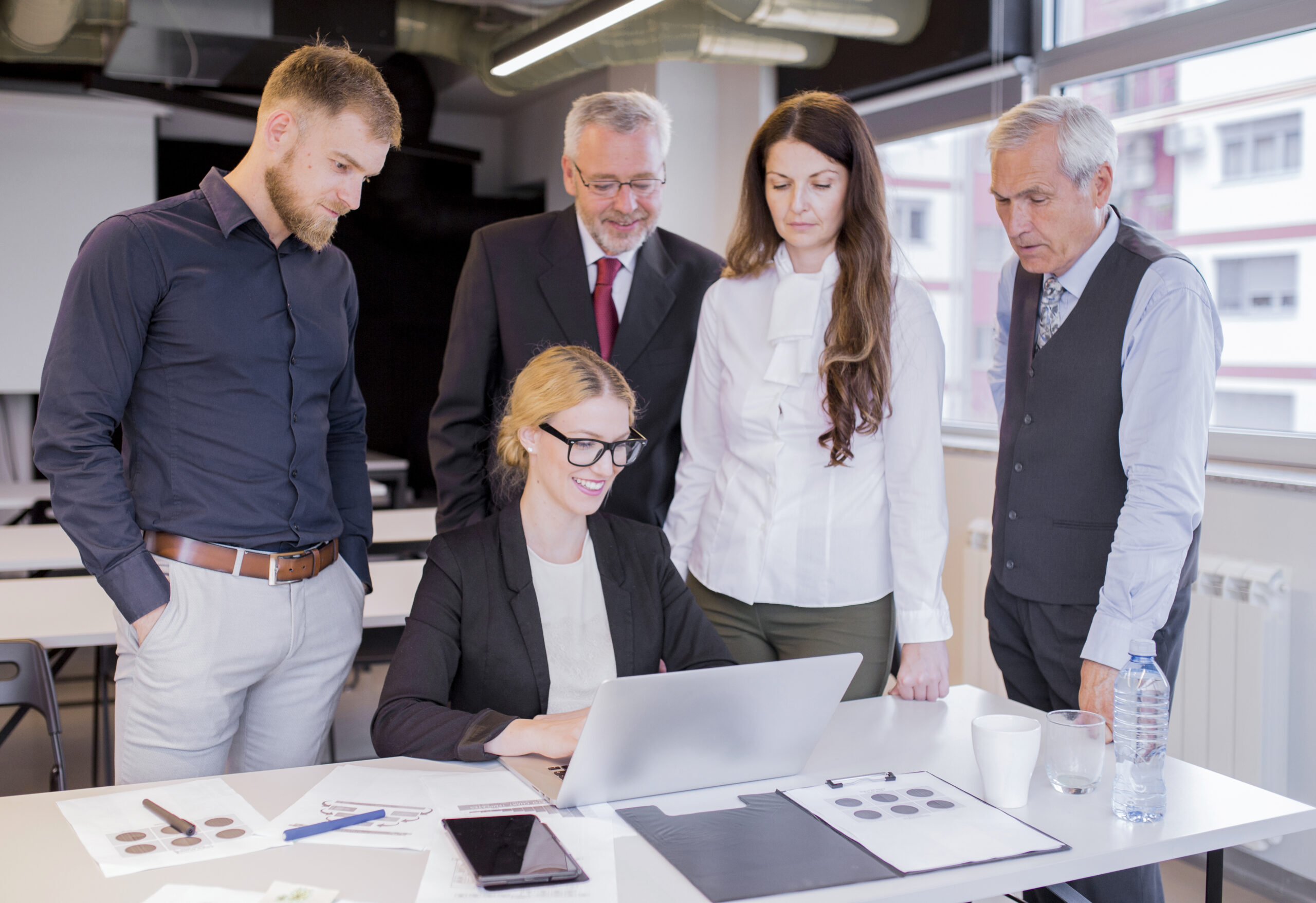 group-business-partners-looking-astonishingly-laptop-display